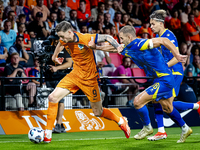 Netherlands forward Wout Weghorst and Bosnia and Herzegovina defender Nikola Katic during the match between the Netherlands and Bosnia and H...