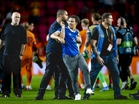 A supporter of Bosnia and Herzegovina stands on the pitch during the match between the Netherlands and Bosnia and Herzegovina at the Philips...