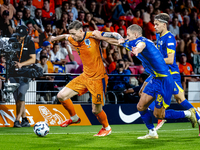 Netherlands forward Wout Weghorst and Bosnia and Herzegovina defender Nikola Katic during the match between the Netherlands and Bosnia and H...