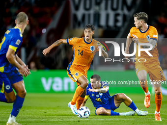 Netherlands midfielder Tijani Reijnders plays during the match between the Netherlands and Bosnia and Herzegovina at the Philips Stadium for...