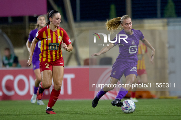 Nikki Ijzerman of Anderlecht is closely followed by Gabriella Zahra of Birkirkara during the UEFA Women's Champions League First qualifying...