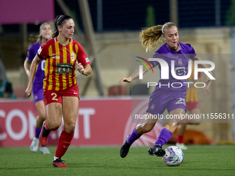 Nikki Ijzerman of Anderlecht is closely followed by Gabriella Zahra of Birkirkara during the UEFA Women's Champions League First qualifying...