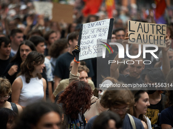 Between 5,000 and 8,000 protesters march in Toulouse and cities across France on Saturday to protest against Macron's choice of Michel Barni...