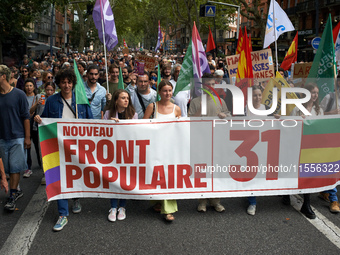 Between 5,000 and 8,000 protesters march in Toulouse and cities across France on Saturday to protest against Macron's choice of Michel Barni...