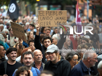 Between 5,000 and 8,000 protesters march in Toulouse and cities across France on Saturday to protest against Macron's choice of Michel Barni...