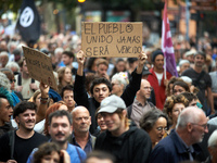 Between 5,000 and 8,000 protesters march in Toulouse and cities across France on Saturday to protest against Macron's choice of Michel Barni...