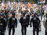 Riot policemen face the protesters. Between 5,000 and 8,000 protesters march in Toulouse, France, on September 7, 2024, to protest against M...