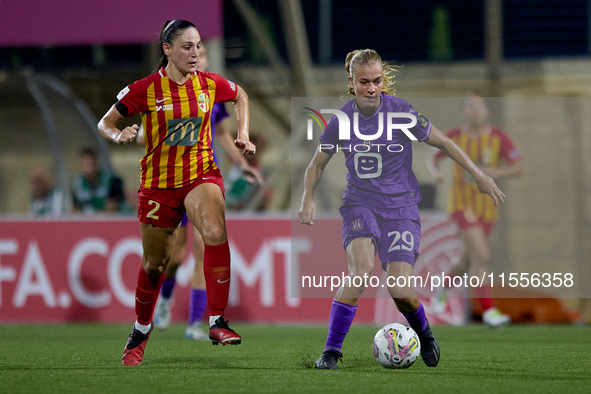 Nikki Ijzerman of Anderlecht is closely followed by Gabriella Zahra of Birkirkara during the UEFA Women's Champions League First qualifying...