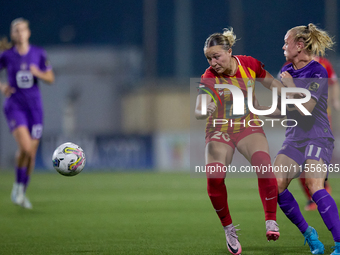 Calista Bonnie Schechinger of Birkirkara competes for the ball with Sarah Wijnants of Anderlecht during the UEFA Women's Champions League Fi...