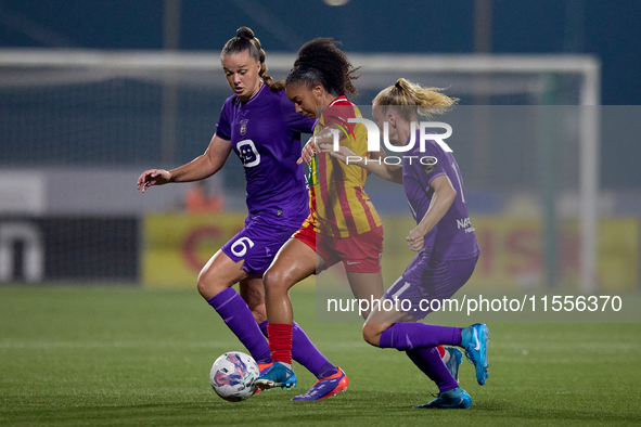 In Ta' Qali, Malta, on September 7, 2024, Luana Vitoria Lourenco Cabral of Birkirkara is closely followed by Tine De Caigny and Sarah Wijnan...