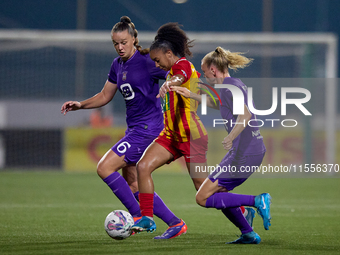 In Ta' Qali, Malta, on September 7, 2024, Luana Vitoria Lourenco Cabral of Birkirkara is closely followed by Tine De Caigny and Sarah Wijnan...