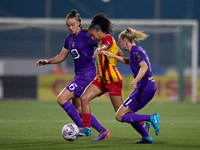 In Ta' Qali, Malta, on September 7, 2024, Luana Vitoria Lourenco Cabral of Birkirkara is closely followed by Tine De Caigny and Sarah Wijnan...