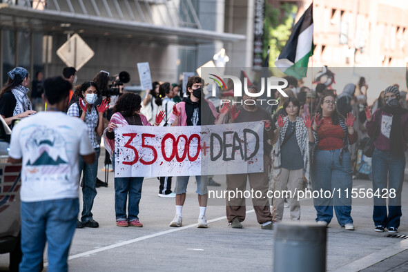 On September 7, 2024, in Washington, DC, two dozen pro-Palestine/Gaza protesters protest outside the Washington Convention Center, where the...