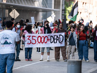 On September 7, 2024, in Washington, DC, two dozen pro-Palestine/Gaza protesters protest outside the Washington Convention Center, where the...