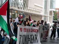 On September 7, 2024, in Washington, DC, two dozen pro-Palestine/Gaza protesters protest outside the Washington Convention Center, where the...