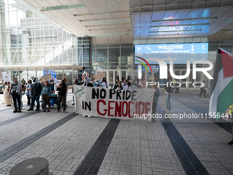 On September 7, 2024, in Washington, DC, two dozen pro-Palestine/Gaza protesters protest outside the Washington Convention Center, where the...