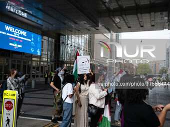 On September 7, 2024, in Washington, DC, two dozen pro-Palestine/Gaza protesters protest outside the Washington Convention Center, where the...