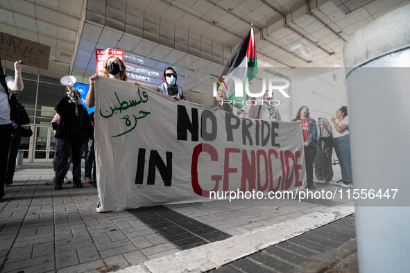 On September 7, 2024, in Washington, DC, two dozen pro-Palestine/Gaza protesters protest outside the Washington Convention Center, where the...