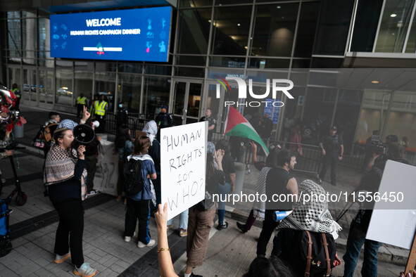 On September 7, 2024, in Washington, DC, two dozen pro-Palestine/Gaza protesters protest outside the Washington Convention Center, where the...