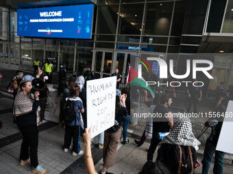 On September 7, 2024, in Washington, DC, two dozen pro-Palestine/Gaza protesters protest outside the Washington Convention Center, where the...