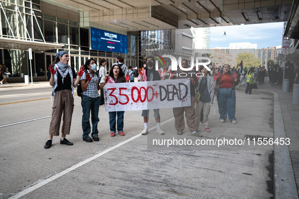 On September 7, 2024, in Washington, DC, two dozen pro-Palestine/Gaza protesters protest outside the Washington Convention Center, where the...