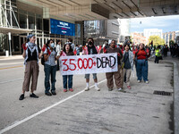 On September 7, 2024, in Washington, DC, two dozen pro-Palestine/Gaza protesters protest outside the Washington Convention Center, where the...