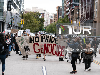 On September 7, 2024, in Washington, DC, two dozen pro-Palestine/Gaza protesters protest outside the Washington Convention Center, where the...