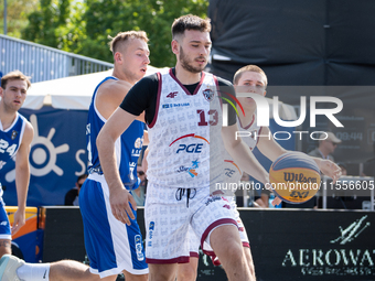 Oliwer Korolczuk participates in the LOTTO 3x3 League basketball game in Sosnowiec, Poland, on September 7, 2024. The Lotto 3x3 Liga tournam...