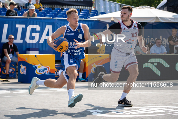 Damian Durski and Oliwer Korolczuk participate in the LOTTO 3x3 League basketball game in Sosnowiec, Poland, on September 7, 2024. The Lotto...