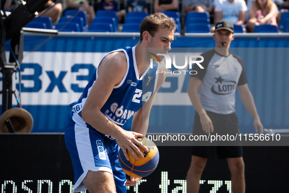 Kacper Marchewka participates in the LOTTO 3x3 League basketball game in Sosnowiec, Poland, on September 7, 2024. The Lotto 3x3 Liga tournam...