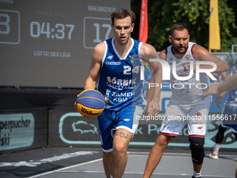 Kacper Marchewka participates in the LOTTO 3x3 League basketball game in Sosnowiec, Poland, on September 7, 2024. The Lotto 3x3 Liga tournam...