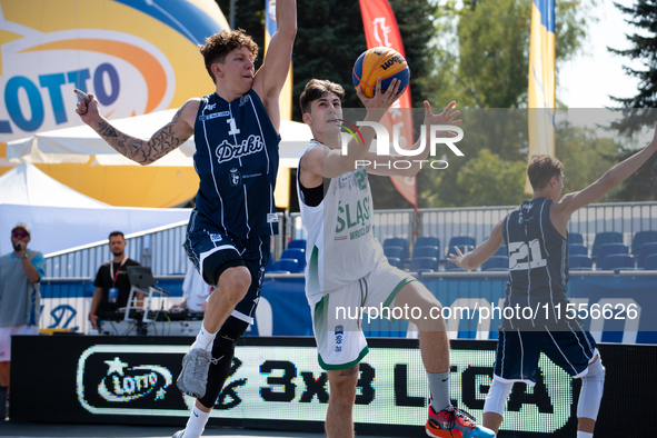 Michal Nowak and Maksymilian Motel participate in the LOTTO 3x3 League basketball game in Sosnowiec, Poland, on September 7, 2024. The Lotto...