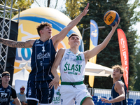 Mateusz Kazmierczak and Maksymilian Motel participate in the LOTTO 3x3 League basketball game in Sosnowiec, Poland, on September 7, 2024. Th...