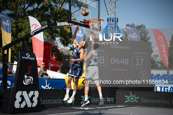 Filip Munyama and Borys Baran participate in the LOTTO 3x3 League basketball game in Sosnowiec, Poland, on September 7, 2024. The Lotto 3x3...