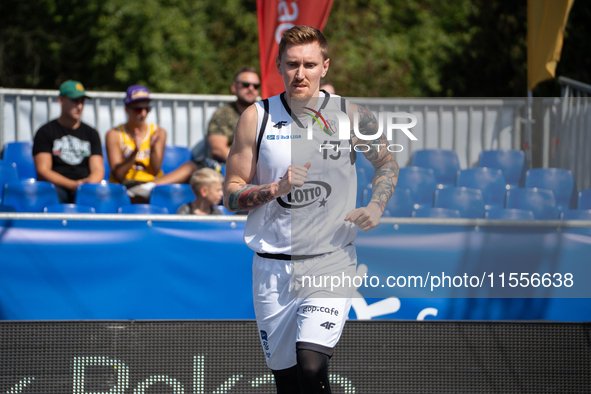 Michal Wojtynski participates in the LOTTO 3x3 League basketball game in Sosnowiec, Poland, on September 7, 2024. The Lotto 3x3 Liga tournam...