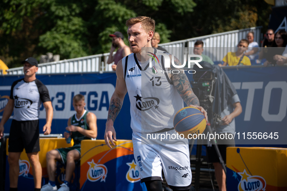 Michal Wojtynski participates in the LOTTO 3x3 League basketball game in Sosnowiec, Poland, on September 7, 2024. The Lotto 3x3 Liga tournam...