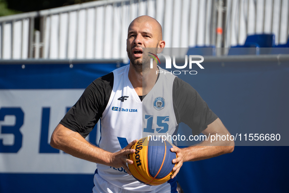 Marcin Zarzeczny participates in the LOTTO 3x3 League basketball game in Sosnowiec, Poland, on September 7, 2024. The Lotto 3x3 Liga tournam...