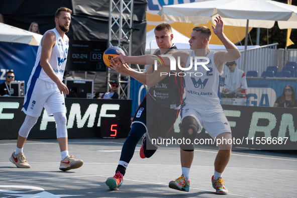 Wiktor Kepka and Kacper Ponitka participate in the LOTTO 3x3 League basketball game in Sosnowiec, Poland, on September 7, 2024. The Lotto 3x...