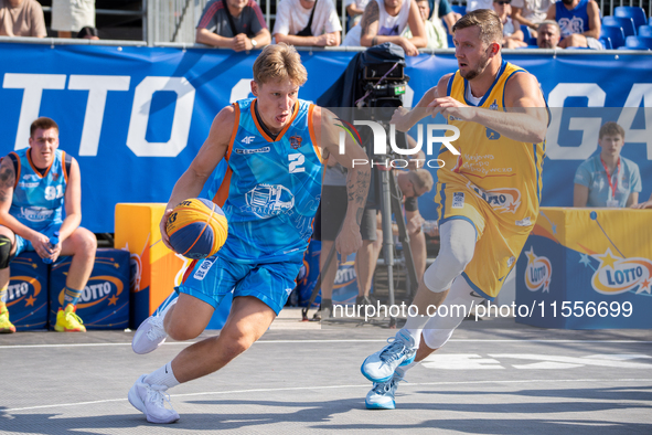 Mateusz Zebrok and Przemyslaw Zamojski participate in the LOTTO 3x3 League basketball game in Sosnowiec, Poland, on September 7, 2024. The L...