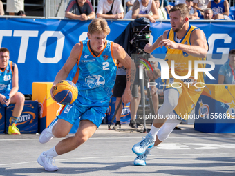 Mateusz Zebrok and Przemyslaw Zamojski participate in the LOTTO 3x3 League basketball game in Sosnowiec, Poland, on September 7, 2024. The L...