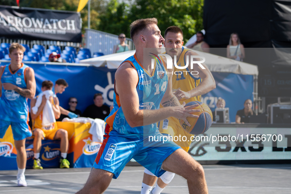 Szymon Wasik participates in the LOTTO 3x3 League basketball game in Sosnowiec, Poland, on September 7, 2024. The Lotto 3x3 Liga tournament...