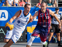 Wojciech Leszczynski and Marcin Biranowski participate in the LOTTO 3x3 League basketball game in Sosnowiec, Poland, on September 7, 2024. T...