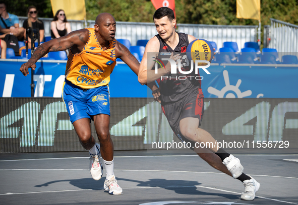 Patryk Przyborowski and Michael Hicks participate in the LOTTO 3x3 League basketball game in Sosnowiec, Poland, on September 7, 2024. The Lo...