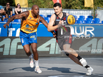 Patryk Przyborowski and Michael Hicks participate in the LOTTO 3x3 League basketball game in Sosnowiec, Poland, on September 7, 2024. The Lo...