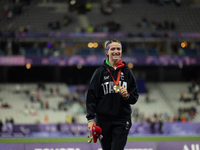 Martina Caironi of Italy wins a gold medal in the Women's 100m - T63 Final at Stade de France during the Paris 2024 Paralympic Games in Pari...