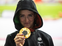 Martina Caironi of Italy poses with the gold medal after the Women's 100m - T63 Final at Stade de France during the Paris 2024 Paralympic Ga...