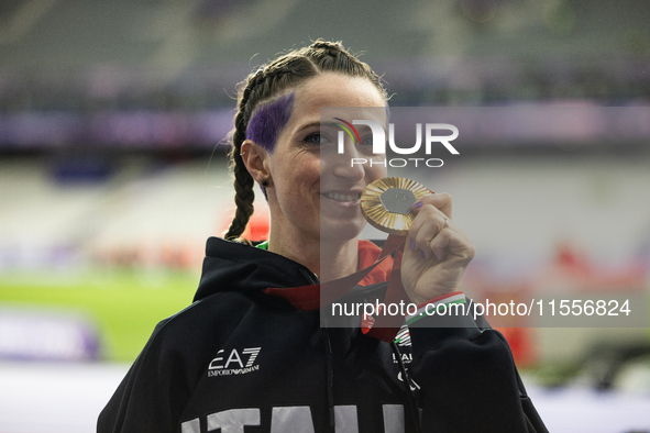 Martina Caironi of Italy wins a gold medal in the Women's 100m - T63 Final at Stade de France during the Paris 2024 Paralympic Games in Pari...