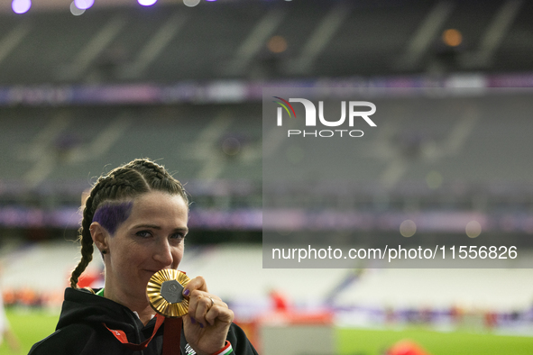 Martina Caironi of Italy wins a gold medal in the Women's 100m - T63 Final at Stade de France during the Paris 2024 Paralympic Games in Pari...