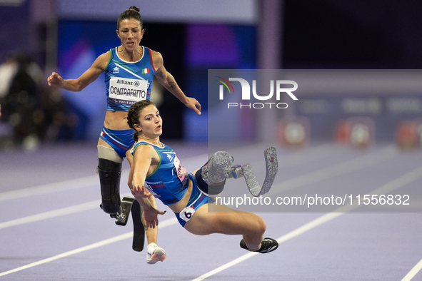 Ambra Sabatini (R) of Italy gets in Monica Contafatto's (ITA) way and makes her fall during the Women's 100m - T63 Final at Stade de France...