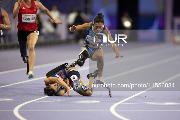 Ambra Sabatini (R) of Italy gets in Monica Contafatto's (ITA) way and makes her fall during the Women's 100m - T63 Final at Stade de France...